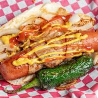 28 Perro De California / 28 California Dog · grilled hot dog wrapped in bacon served with grilled onions,ketchup,mustard, grilled Chile t...