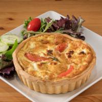 Goat Cheese Quiche · Quiche with goat cheese bacon and tomatoes