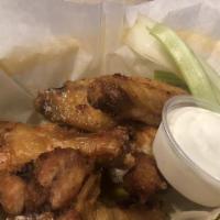 Traditional Wings (6) · Your choice of sauce, from mild to spicy served with blue cheese or ranch dressing.