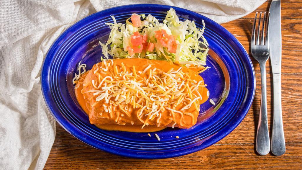 Chimichanga · Deep-fried burrito filled with rice, beans, cheese and your choice of meat, and sauce.