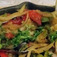 Veggie Fajitas · Served with sautéed fresh peppers, onions, yellow squash,  rice, beans, lettuce and warm cor...