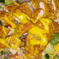 Daisy'S Delight* · Crisp Lettuce, Fried Chicken, Tortilla Chips, Cheddar Cheese, Jalapeno, Diced Tomato, Red On...