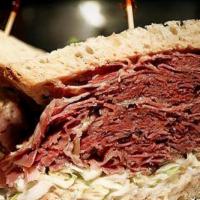 New Yorker* · Corned Beef double Swiss Cheese and Coleslaw on Rye Bread