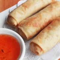 Chicken Egg Rolls · Our homemade ground chicken & sliced vegetable egg rolls, served with tangy
sweet & sour sau...
