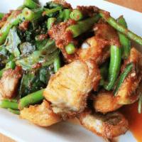 Chili Paste Catfish (Gf) · Fried catfish sauteed with red curry paste,Thai eggplant and green beans.