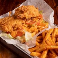 Fried Catfish Po Boy Sandwich · Served with tomato, lettuce, remoulade sauce, and fries. Choice of fries: Cajun fries, regul...