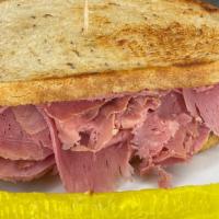 Sandwich · 6 OZ OUR DELICIOUS  HAND CRAFTED  FRESH CORN BEEF SANDWICHES MADE CUSTOM TO FIT YOUR TASTEBU...