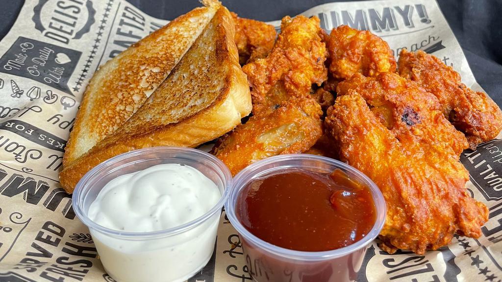 12 Wings (Chicken Only) · DELICIOUDLY MEATY, BONE-IN CHICKEN WINGS. COATED WITH A  LIGHT, SAVORY AND CRISPY BREADING. ALSO COMES IN A REGULAR AND SPICY FLAVOR SERVED WITH OUR DELICIOUS GRIIL TEXAS TOAST AND CHOICE OF RANCH OR BBQ SAUCE.