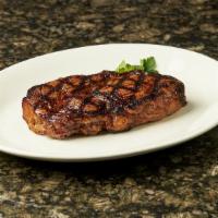Ribeye · 14 ounce excellent marbling, loaded with flavor. Served with choice of traditional side.