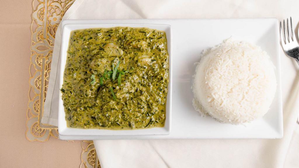 Palak Paneer · Paneer cooked in a creamy spinach sauce.
