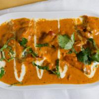 Chicken Tikka · Tender chicken breast marinated in yogurt and spices broiled in the tandoor.