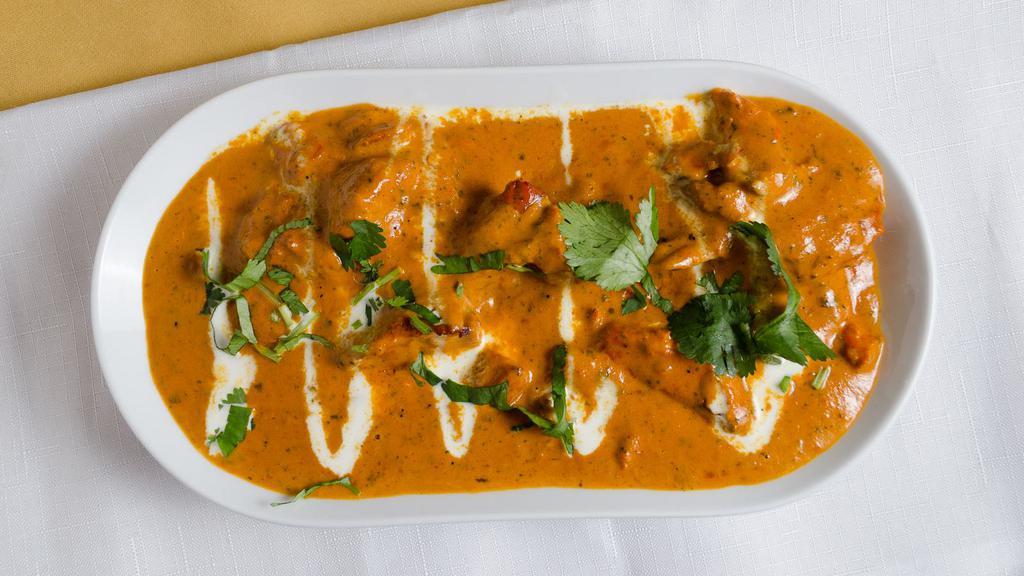 Chicken Tikka · Tender chicken breast marinated in yogurt and spices broiled in the tandoor.