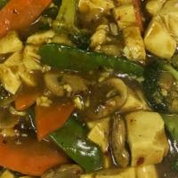 Curry Vegetable With Tofu (Hot) · Stir fry fresh vegetables in a spicy curry sauce tossed with soft tofu. Hot and spicy.