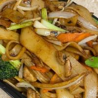 Vegetable Chow Fun · Stir fry fresh vegetables tossed in a high flame with flat wide rice noodle and minced garlic.