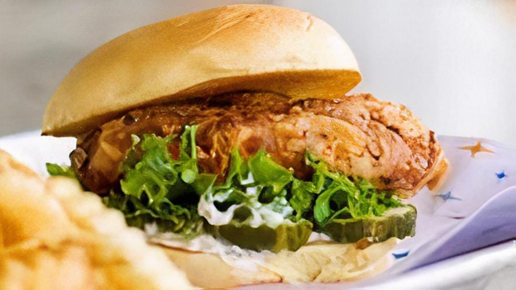 Crispy Chicken Sandwich · Hand Breaded Chicken Breast, Lettuce, Pickles, Prairie Ranch, Martin's Potato Roll