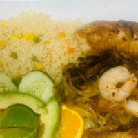 Filete Azeteca · Tilapia filet and shrimp cooked with mushrooms, onions with rice & salad.