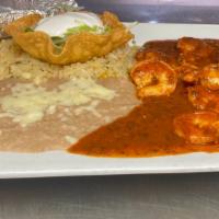 Camarones Rancheros · Grilled shrimp cooked with ranchero sauce. Served with rice, lettuce, tomatoes, sour cream a...