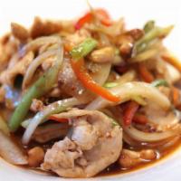 The Cashew Nuts · Meat stir-fried with cashew nuts, carrots, mushrooms, water chestnuts, and onions.