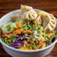 Lamb Bowl · This bowl consists of four lamb dumplings, our delicious curry lamb and your choice of rice ...