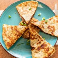 Steak Quesadilla · 5 cheeses, bell peppers, & onion.