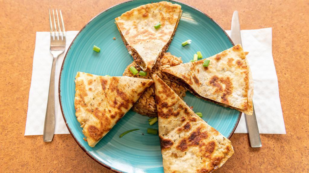 Steak Quesadilla · 5 cheeses, bell peppers, & onion.