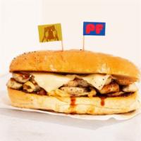 Chicken Cheesesteak · Sliced grilled chicken sandwich with grilled onions and american cheese.
