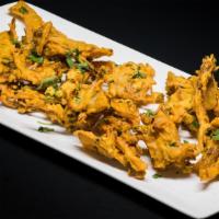 Onion Bhajee · Finely chopped fresh onions in lightly spiced chickpea flour; fried to perfection.