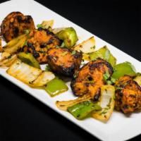 Chicken Tikka · Boneless morsels of chicken marinated in yogurt and spices; skewered and cooked in tandoor.