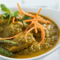 Chicken Haryali · Chicken with green chilies, coconut milk, mint, coiander, and other spices.