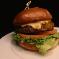 Four Points Classic Burger · Four points favorites. 1/2 lb Angus beef topped with Wisconsin aged cheddar cheese, lettuce,...