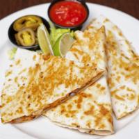 Grilled Quesadilla · Grilled flour tortilla with pepper jack cheese, bell peppers, and onions.
