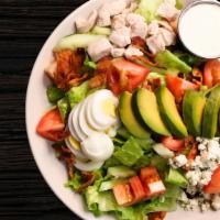 Chopped Salad · Four points favorites. Chopped romaine lettuce, tomato, cucumber, pickled onion, blue cheese...