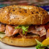 Smoked Salmon Bagel · Paprika-caper cream cheese, mixed greens & cucumber, served with Moscow Fries