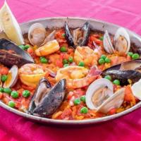 Valenciana · Saffron rice with chicken, shrimp, mussels & clams