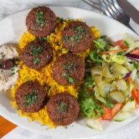 4 Pieces Falafel (Deep Fried Ground Chickpeas & Veggie Ball) · Chickpeas ground with parsley, cilantro, onion, garlic, celery, green peppers and spices sha...