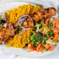 Chicken Shish Kabob Entrée · Charbroiled Mediterranean style marinated chunk chicken breast served with rice, hummus, sal...