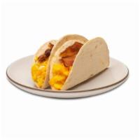 Bacon Egg & Cheese Breakfast Taco · Slagel Farm Bacon, cage-free Egg, Local Cheddar on a flour tortilla.