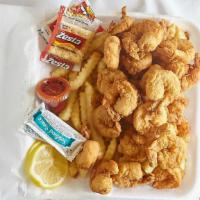 Large Jumbo Shrimp Dinner · 20 pieces. Includes dinner rolls, lemon wedges, and choice of two sides.