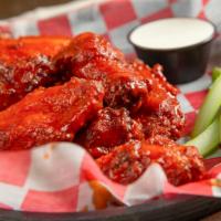 Jumbo Wings · Served with one of our signature sauces: buffalo, spicy garlic, BBQ.