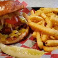 Southern Chicken Sandwich · Hand breaded and fried chicken breast, topped with lettuce, tomato, sweet pickle chutney and...