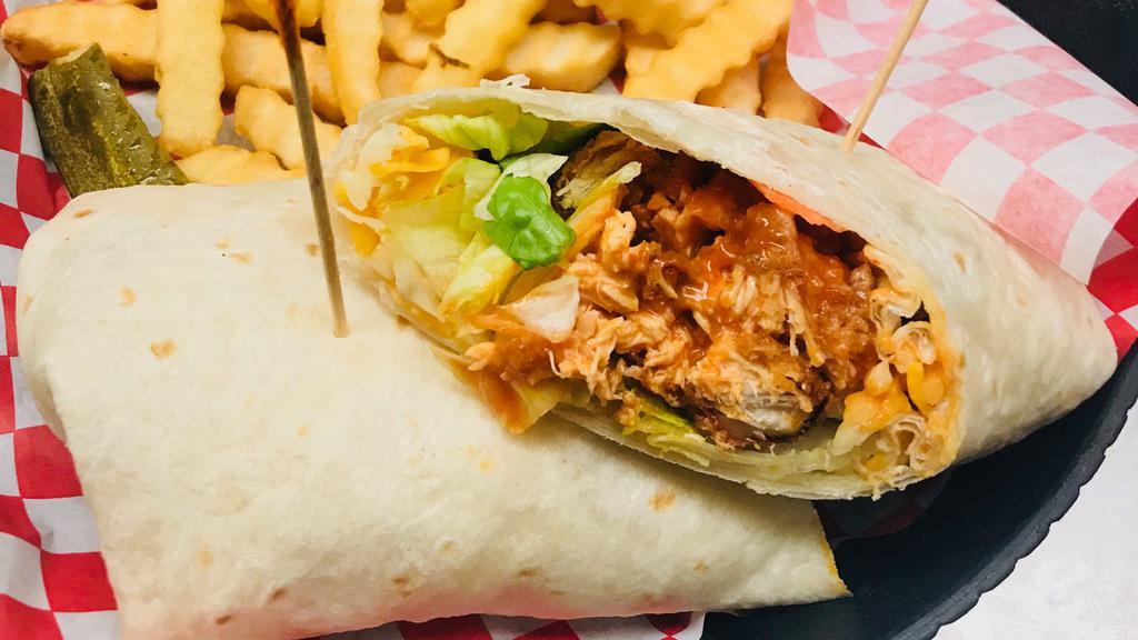 Buffalo Chicken Wrap · Grilled or fried chicken tossed in buffalo sauce, lettuce, tomato and mixed cheese.