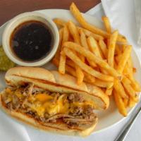 Philly Cheesesteak · Steak and grilled onions topped with your choice of St. Louis style pizza cheese, pepper jac...