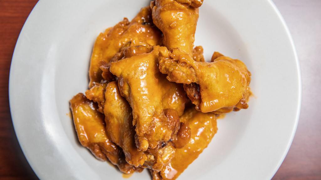 Traditional Wings · The gold standard. Our traditional buffalo wing sauce.