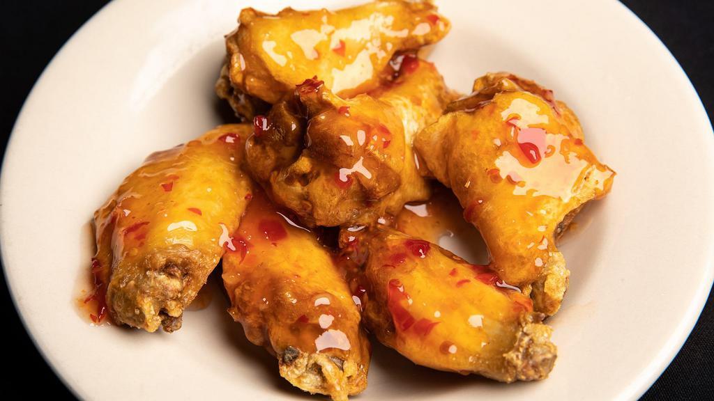 Sweet Chili Sauce Wings · Sweet sauce with spicy chilli flakes.