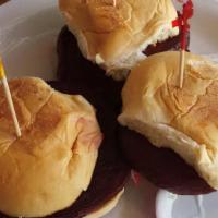 Beet Sliders · Marinated beet slices topped with red onion and green goddess dressing.