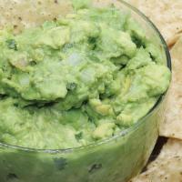 Large Guacamole & Chips · Fresh Homemade Guacamole. Mixed everyday with fresh Mexican avocados, diced tomatoes, choppe...