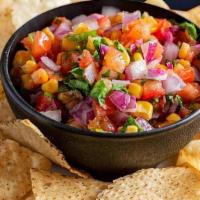 Large Pico De Gallo & Chips · Fresh diced tomatoes, chopped onions, cilantro, serrano peppers, sweet corn and squeezed lim...