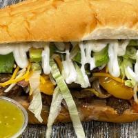 Torta · Choice of protein, filled with refried beans, lettuce, tomatoes, sliced avocado, cheese and ...