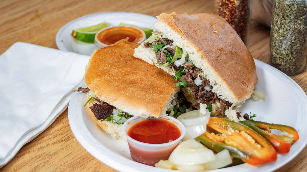 Torta · Choice of meat, beans, lettuce, cheese, sour cream, avocado, tomato and salsa.