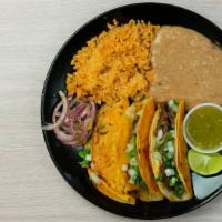Birria Special · 3 Birria Tacos served with rice, beans & consome for dipping.